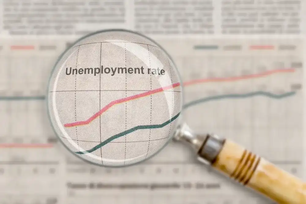 Unemployment rate graphic with a magnifying glass