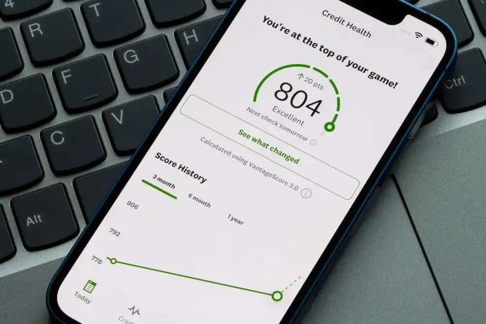 Smart phone showing a loan application and credit score