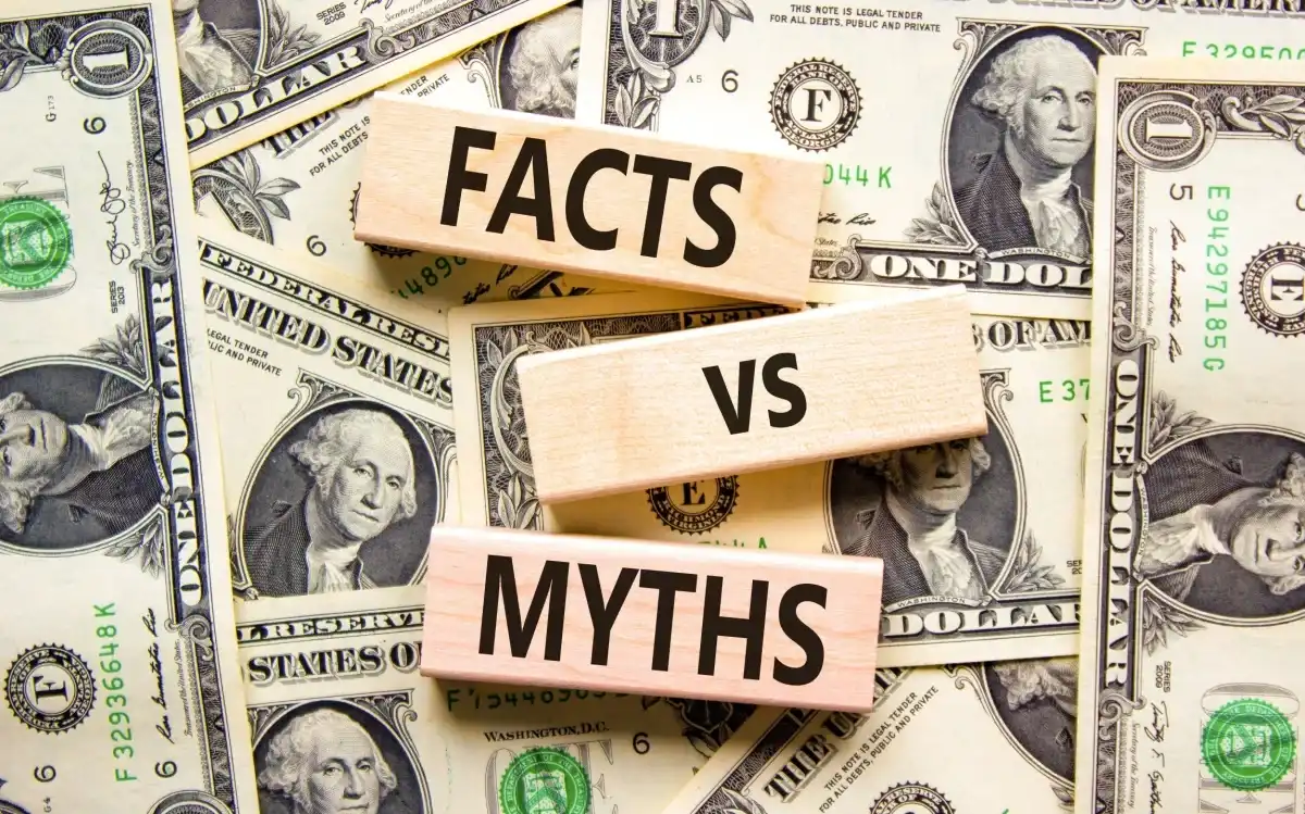 Blocks that read "Facts vs Myth" atop dollar bills