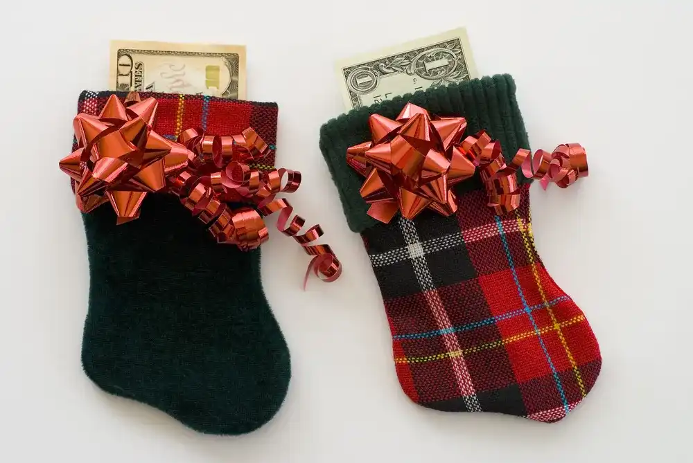 Stockings with money in them, representing holiday loans