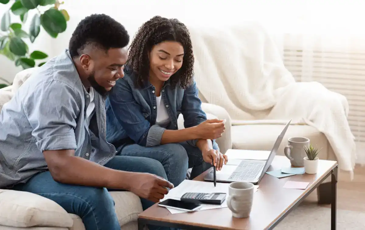 A couple working on mastering their finances