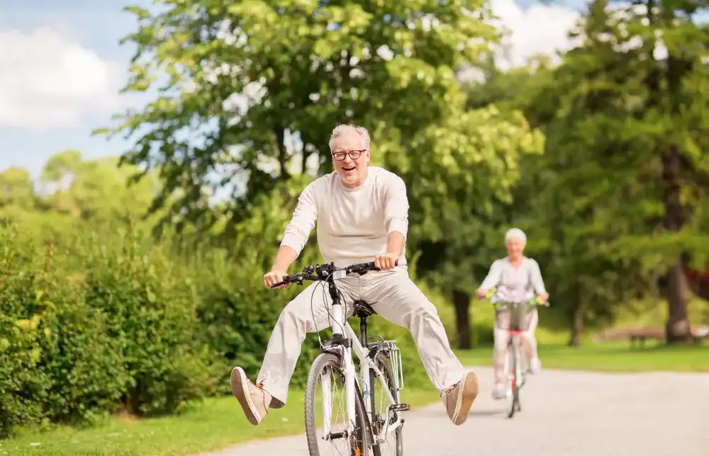 Older couple celebrating getting a loan