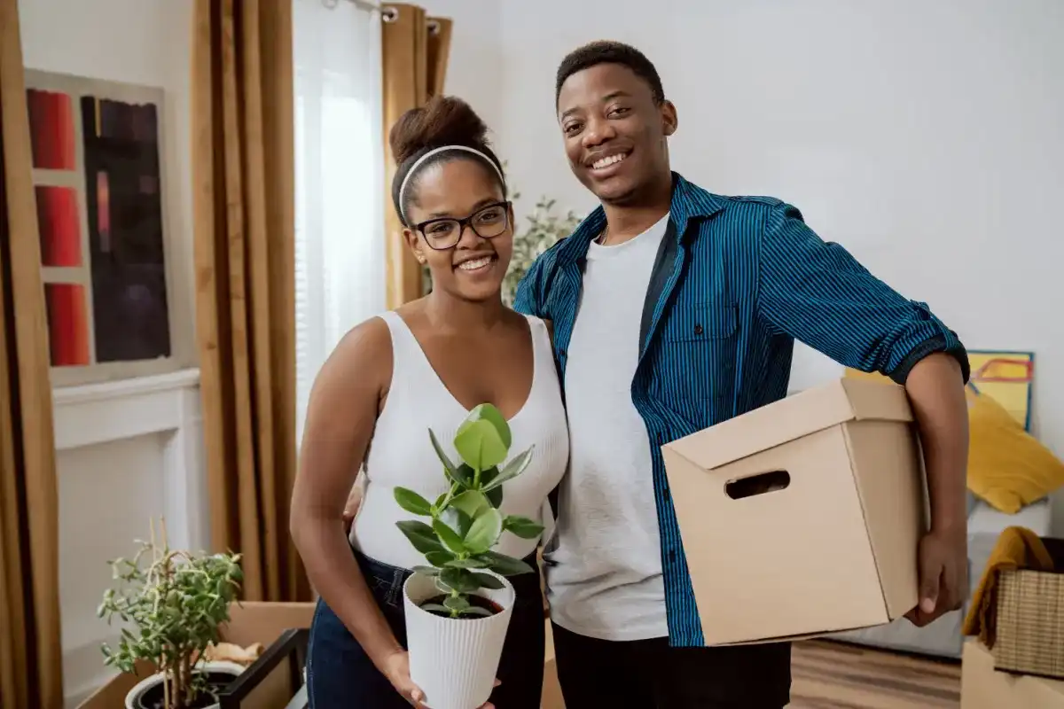 A college couple moving into an affordable house together
