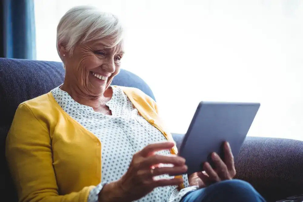 A woman researching cost-effective senior housing