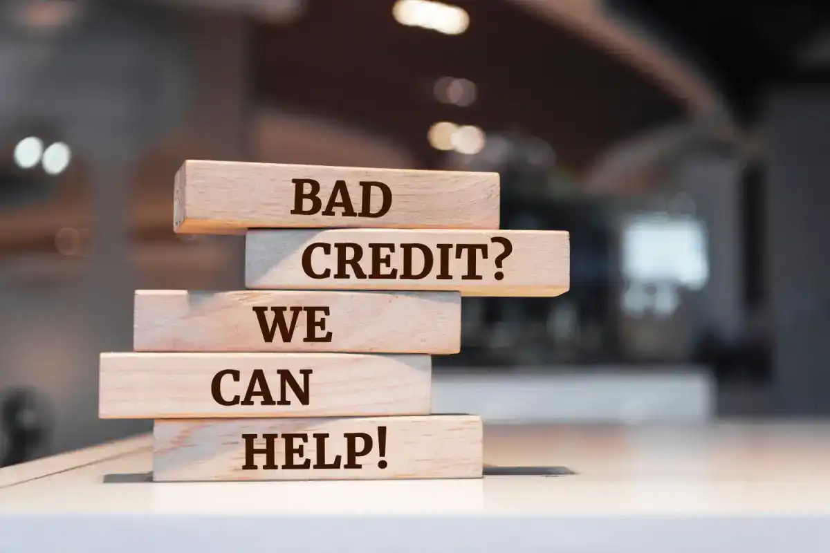 Blocks stacked, reading "Bad Credit? We Can Help!"