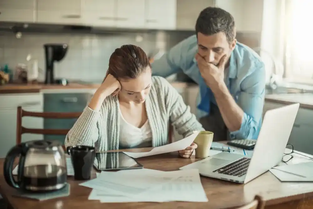 A couple working through financial hardship together