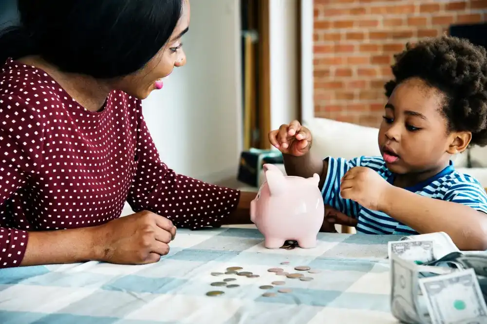 A mother teaching their child financial responsibility 