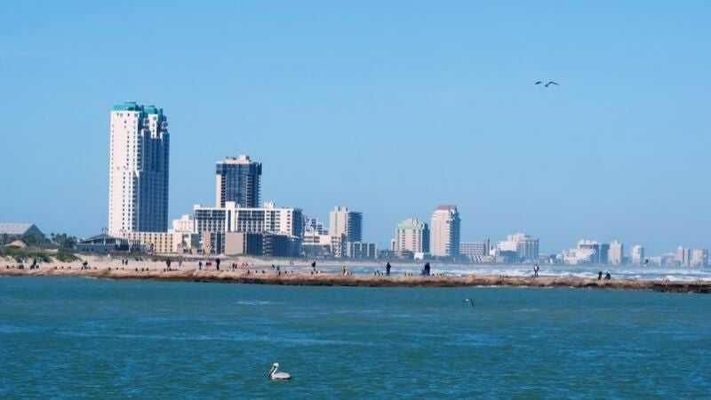 Ocean view of the beach and skyline in South Padre Island, Texas.