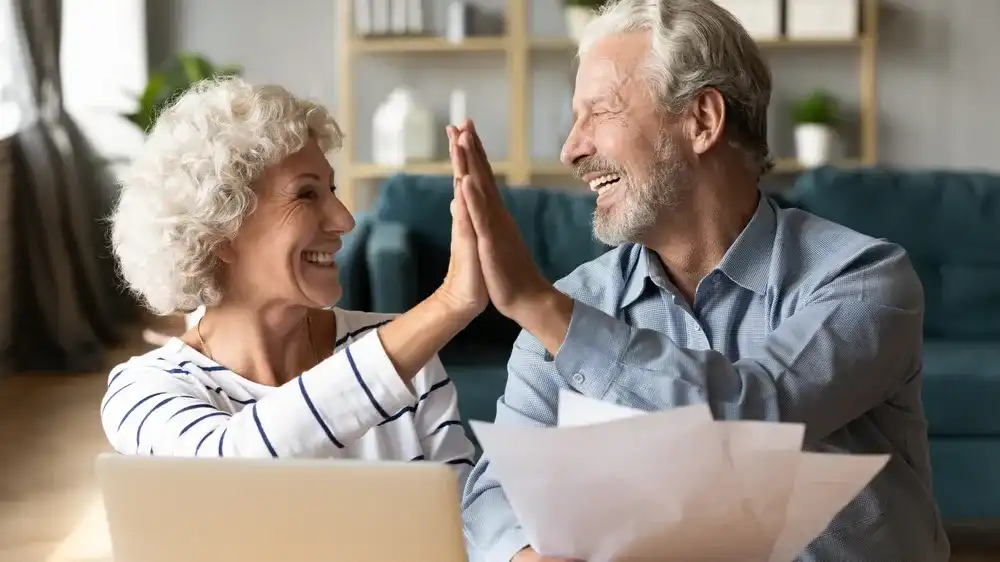 An elderly couple adapting to economic changes