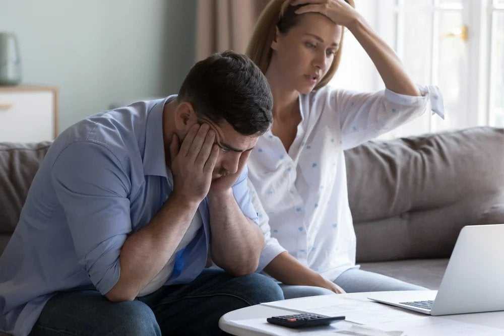 Couple trying to figure out how to deal with emergency expenses