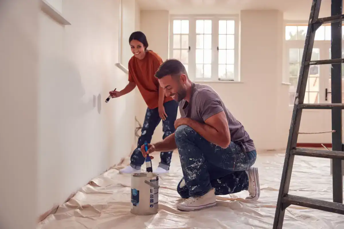 A couple using their personal loan for painting their house