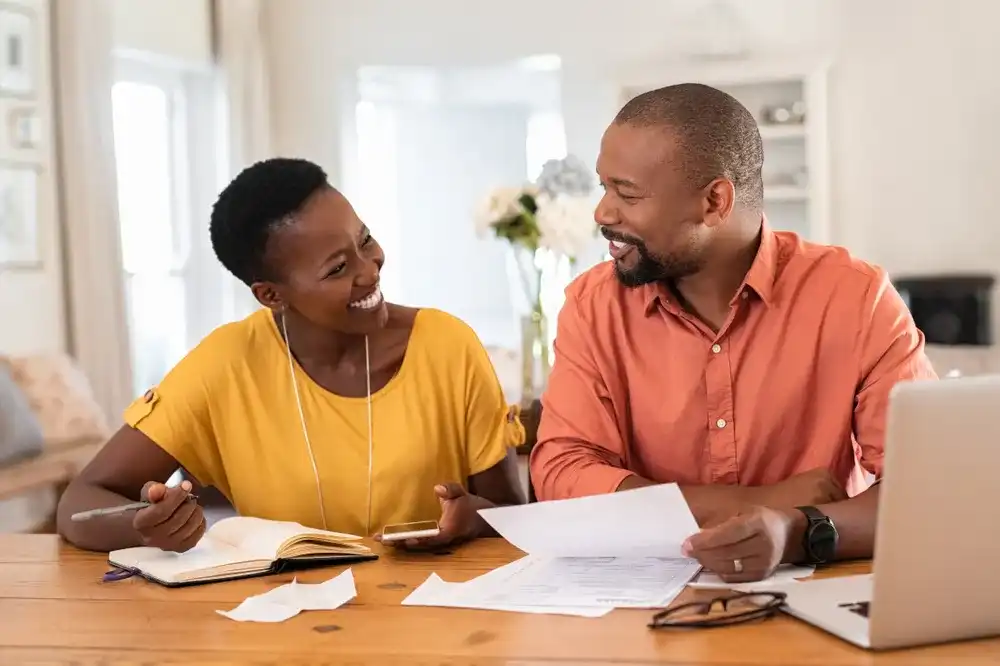A couple budgeting together for different seasons