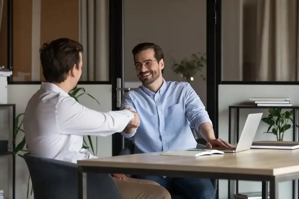 Man interviewing at a loan company | Cash Store