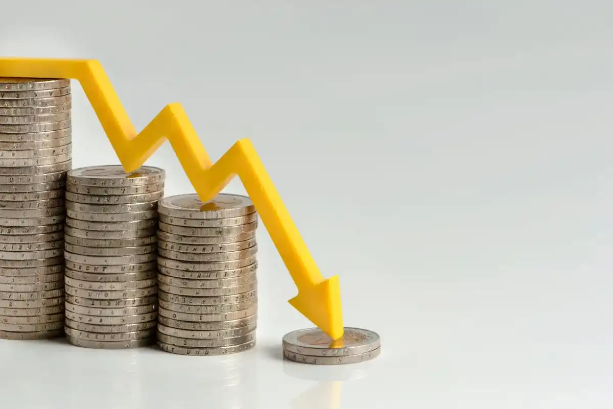 Coins being stacked to represent a recession