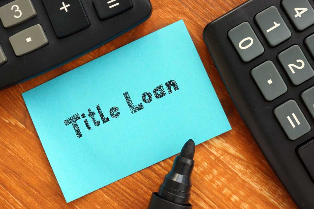 Sticky note saying title loans, which are short-term loans that use your vehicle title as collateral