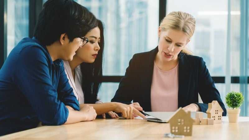 Couple taking out a home loan to purchase their home