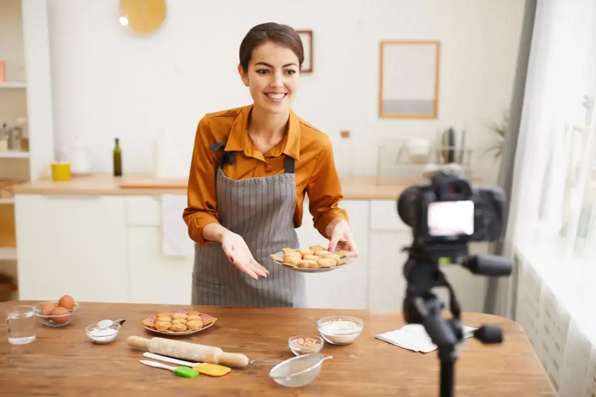 Woman producing online cooking content for her side hustle