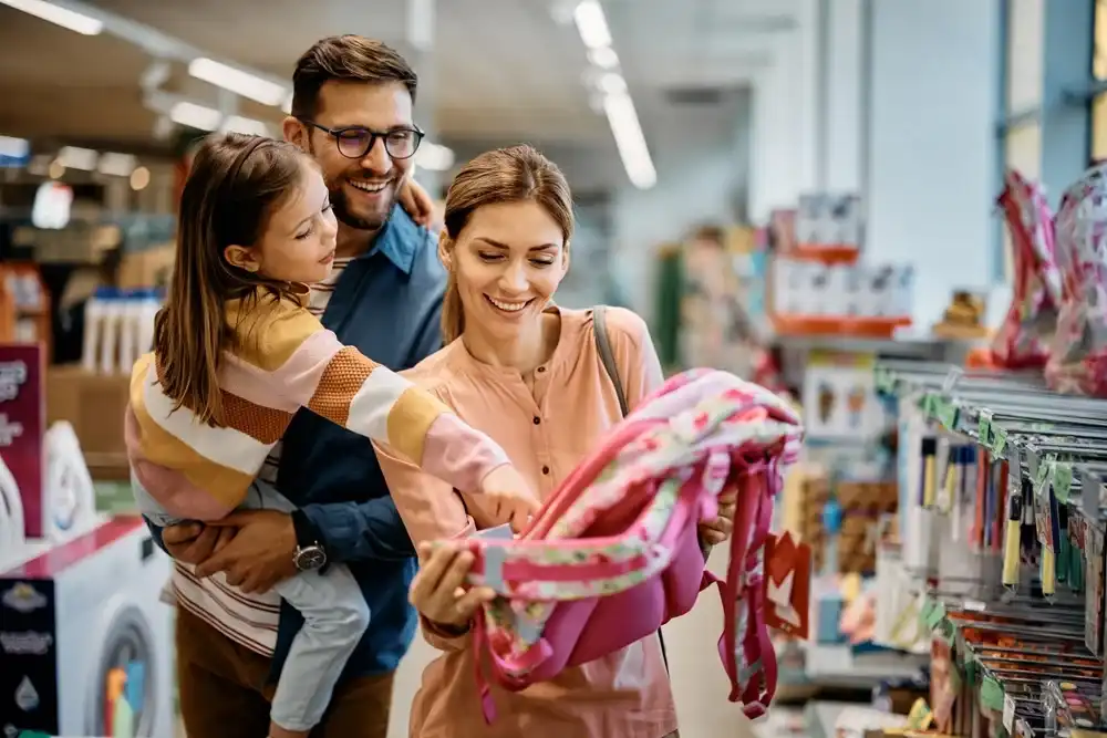 A family shopping in store together opposed to online shopping