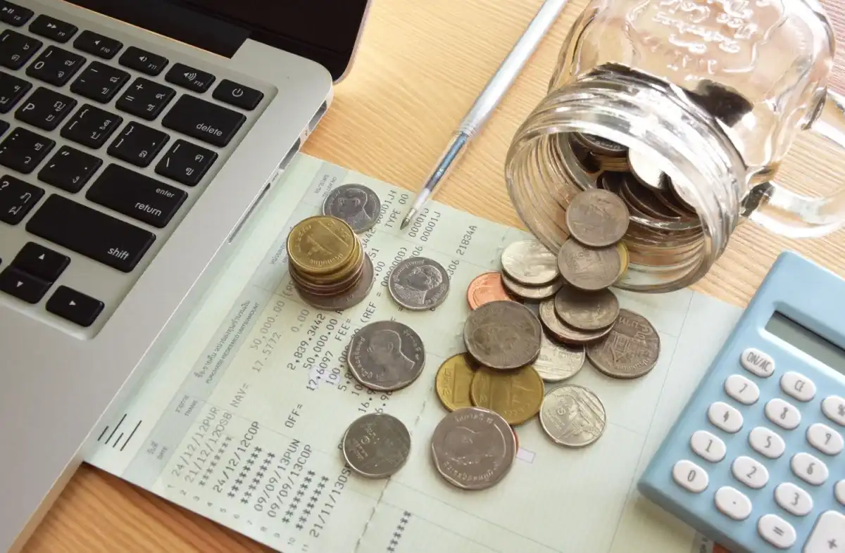 Coins spilled on top of multiple loans