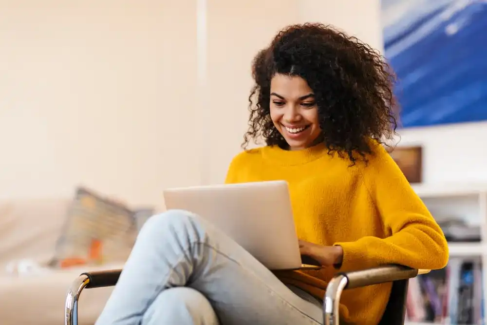 A woman researching how to avoid common financial mistakes