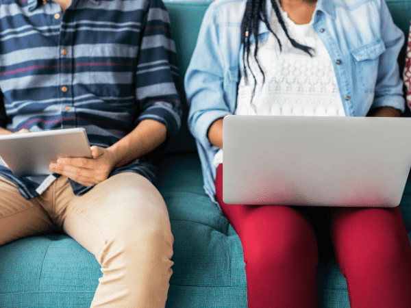 Couple researching title loan options