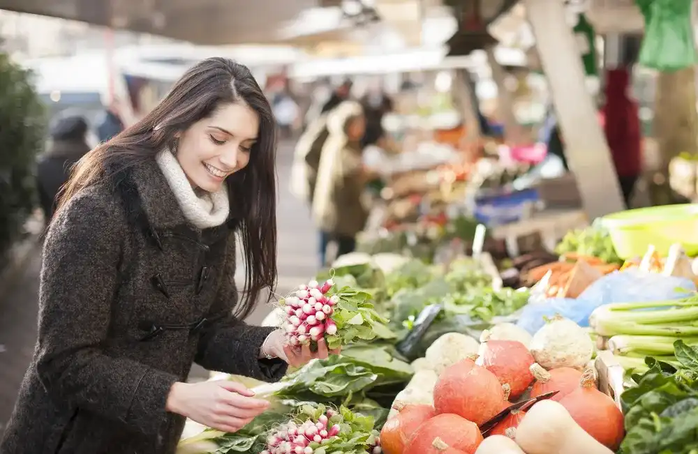 Woman shopping for affordable, healthy food