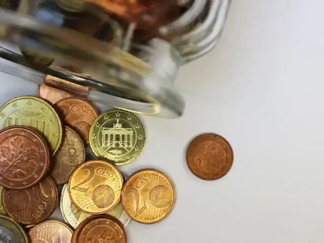 A pile of change representing new financial goals of a new year